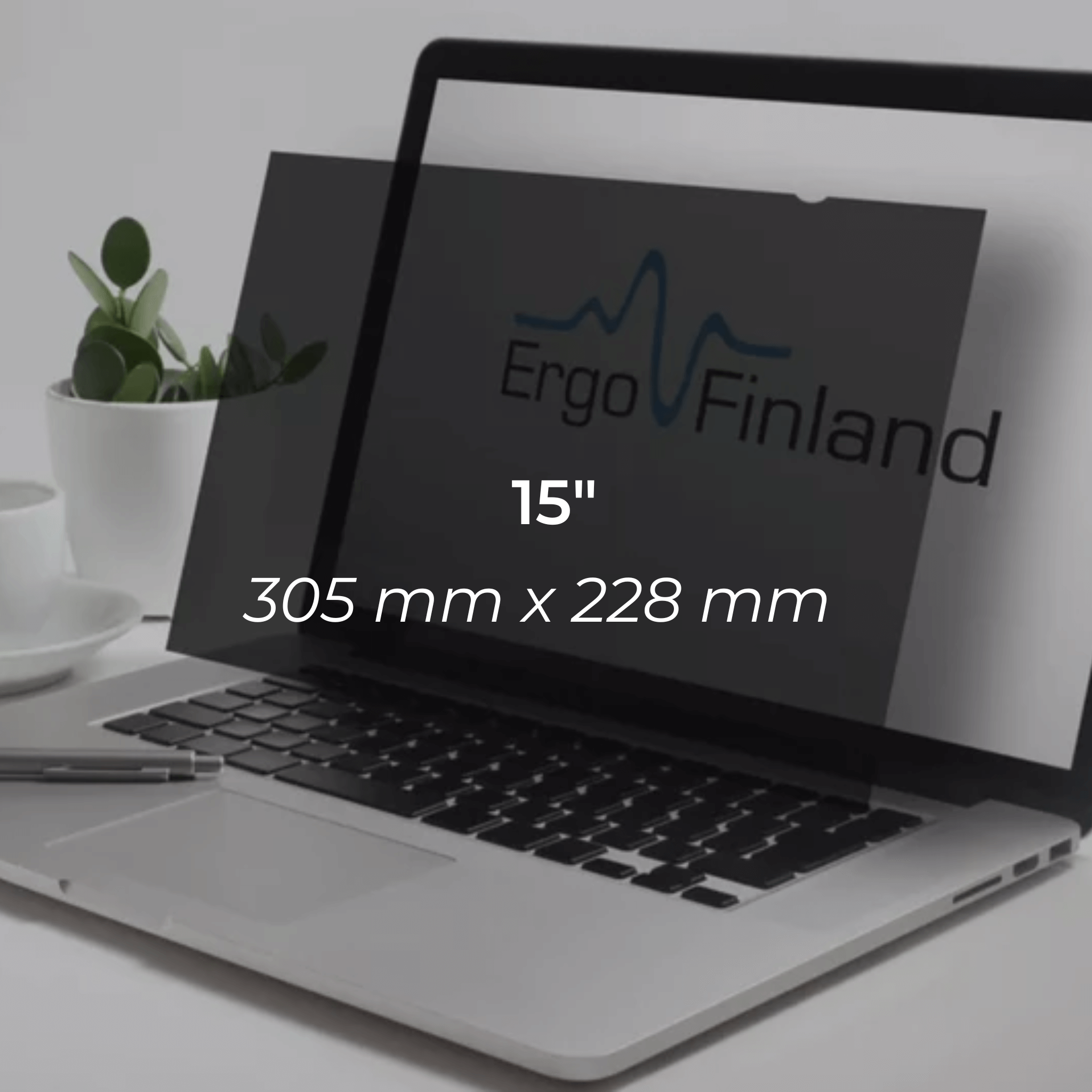 Laptop with privacy filter screen, 15" wide, displaying Ergo Finland logo. Protects from scratches and reduces glare.