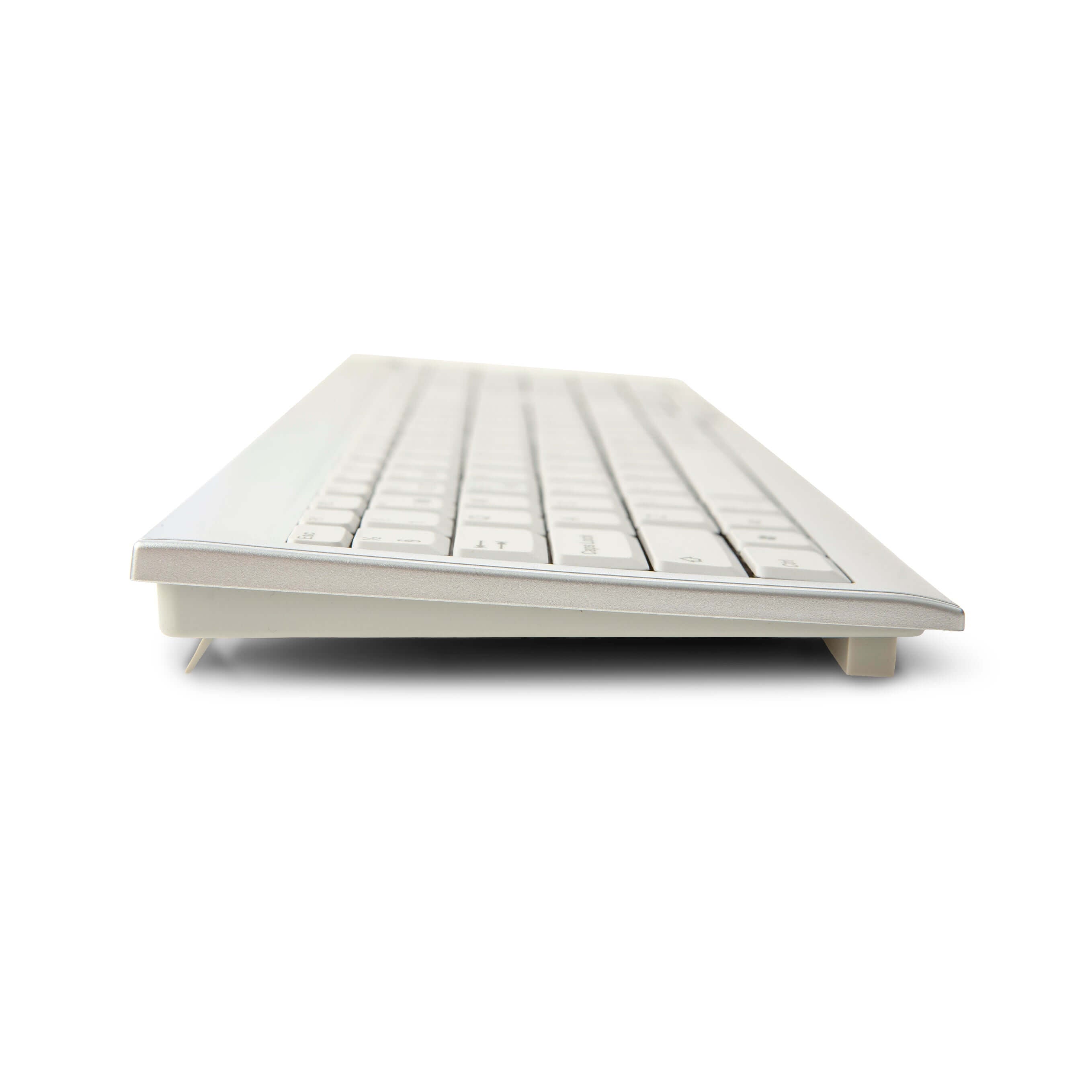 Slim side view of ErgoFinland Efficient Silver Keyboard showcasing compact design and elevated typing angle for enhanced comfort.