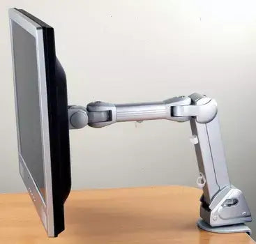 Gas spring LCD monitor arm demonstrating adjustable positioning on a desk