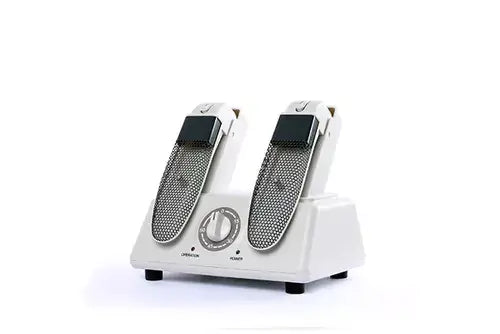 Shoe dryer and odour eliminator with adjustable timer for effective ozone treatment.