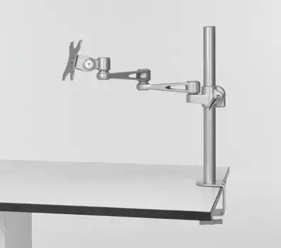 Silver ErgoFinland monitor arm mounted on a desk, featuring adjustable height and pivot for enhanced comfort in professional settings.