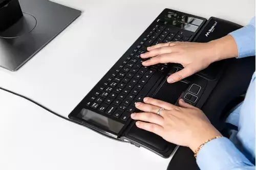 Ergonomic Type keyboard with adjustable height, solar panels, and Mousetrapper mouse controller for optimal comfort and productivity.