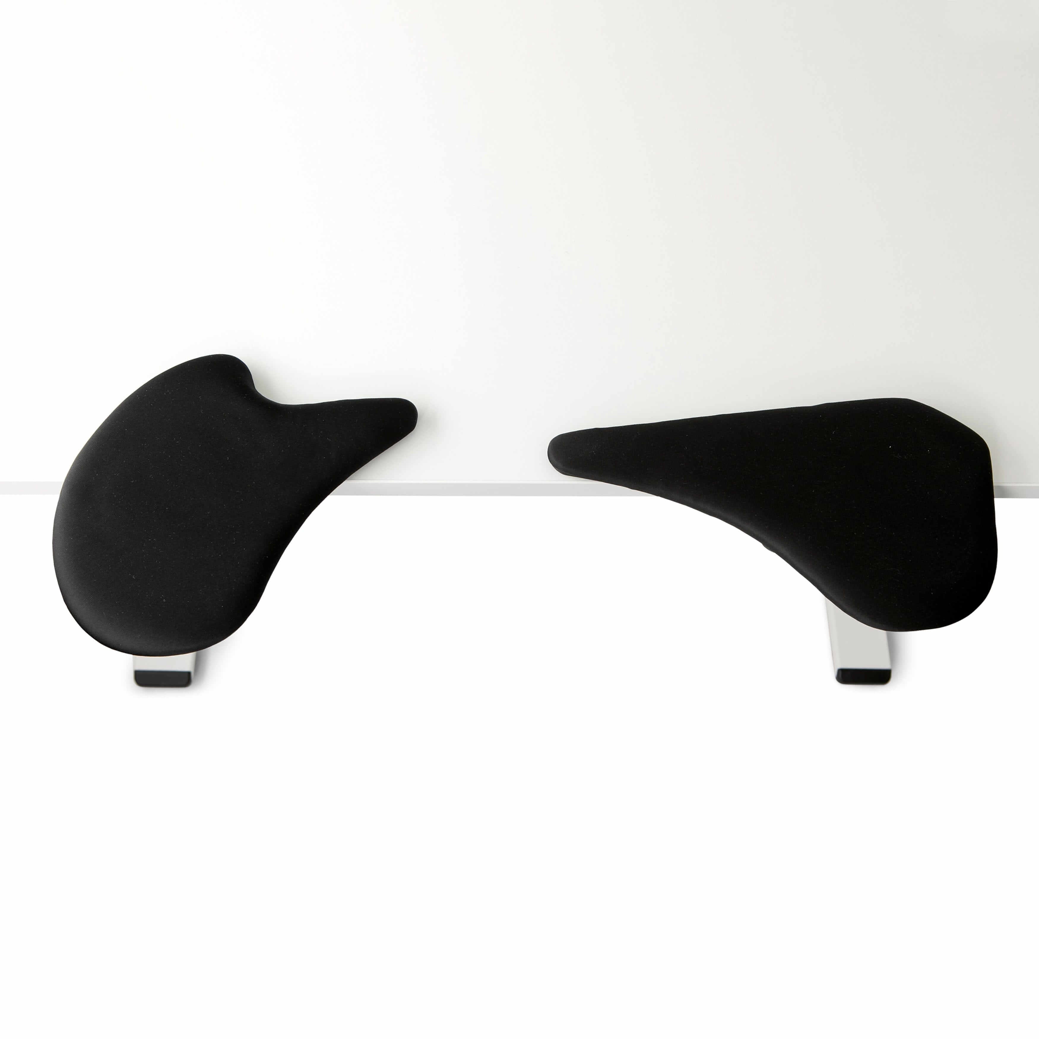 Ergonomic 2-part armrest in faux leather attached to a desk, enhancing customisation for keyboard and mouse use.