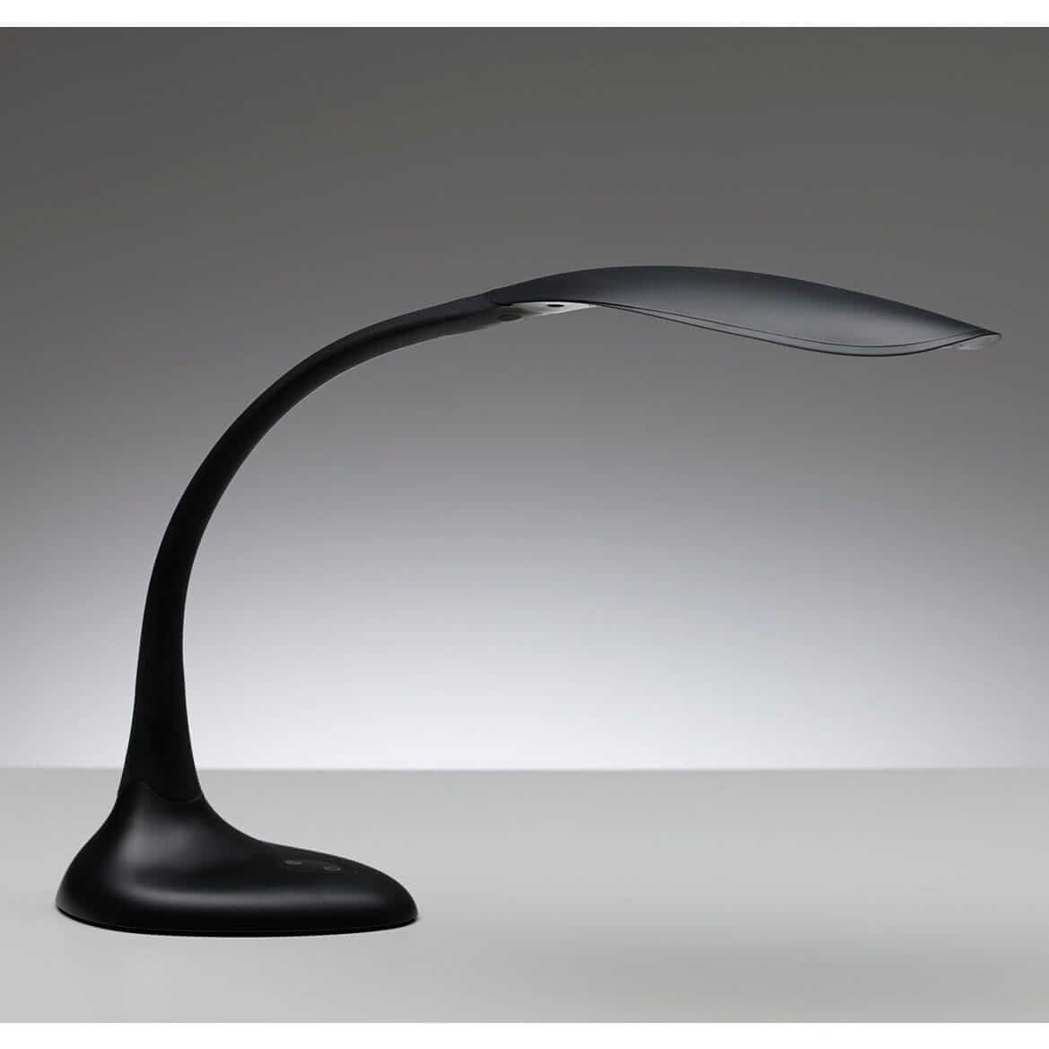 Sleek black Flexlite LED desk lamp with ergonomic design and adjustable arm for versatile lighting solutions.