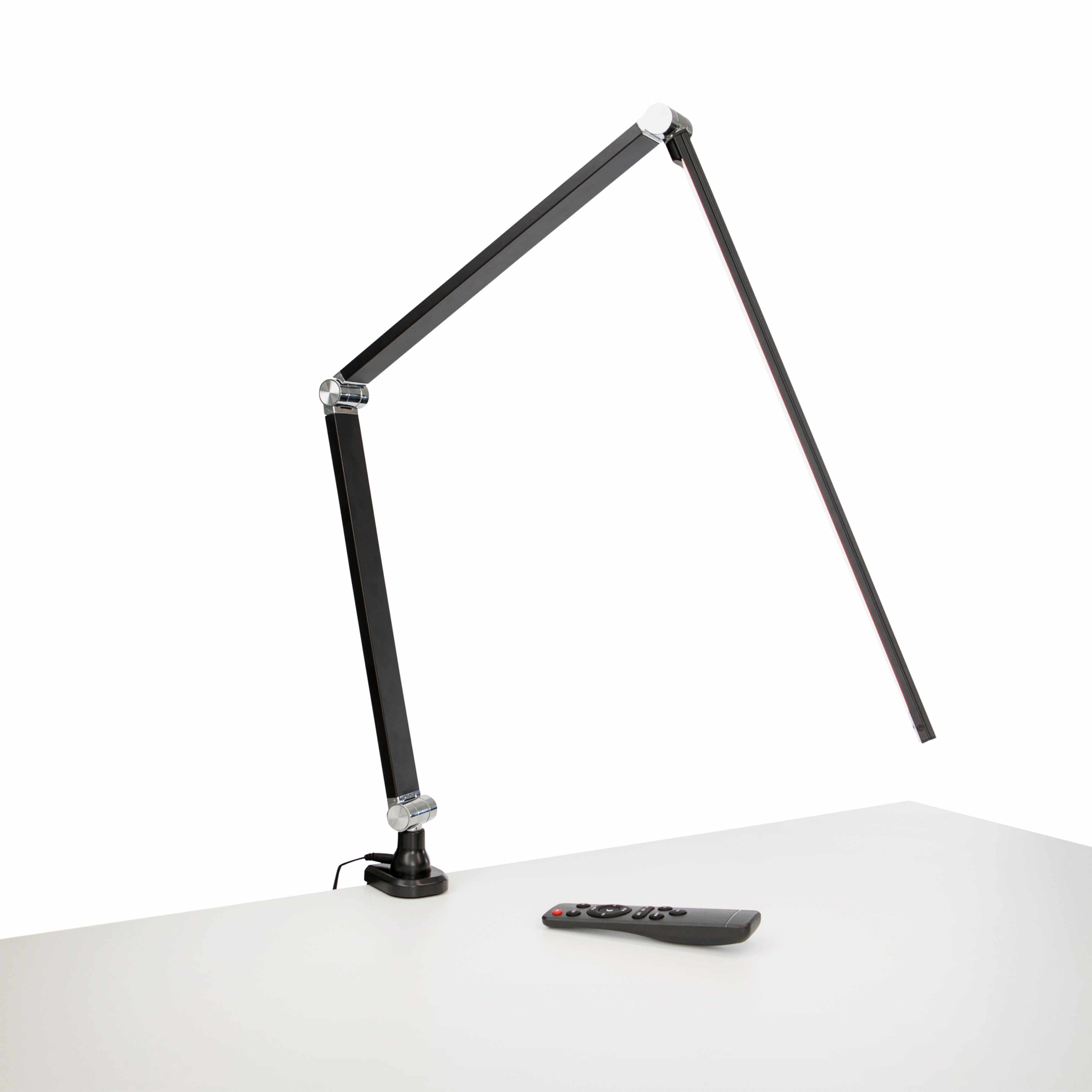 Black Link LED desk lamp with adjustable metal arm and remote, perfect for modern workspaces.